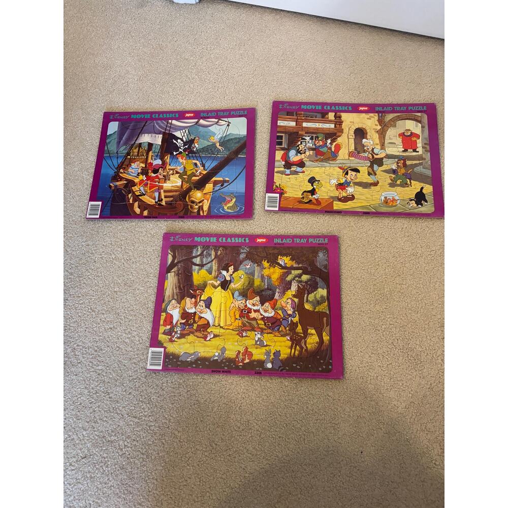 vintage Disney puzzle bundle with Peter Pan, Pinocchio, and Snow White